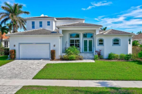 2017 built waterfront home w/ heated pool, hot tub & two master suites